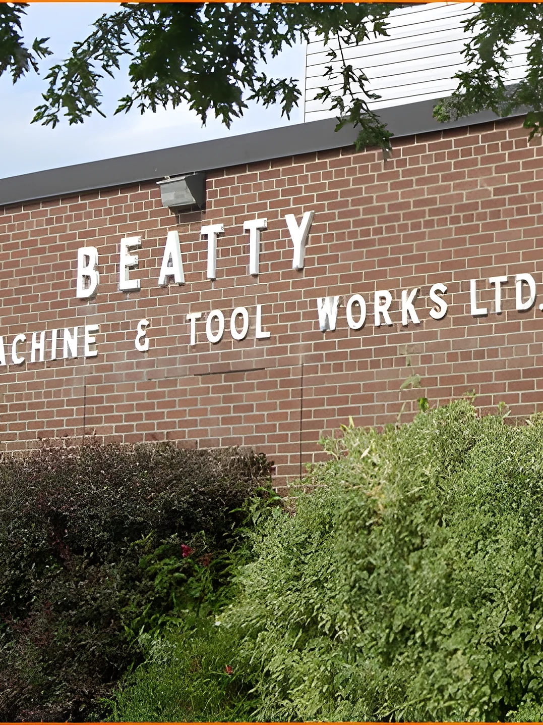 Beatty Machine & Tool Works Ltd brick building signage at 103 Crockford Blvd, Scarborough